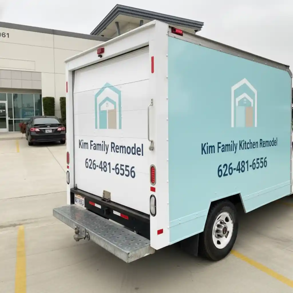 Kim Family Kitchen Remodel branded work van parked at job site